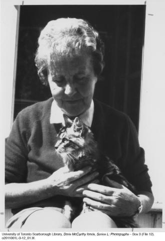 Pearl (Ginty) McGinnis holding a cat
