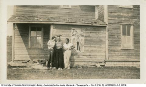 Curry, Nory, and Doris in front of studio in Gaspé