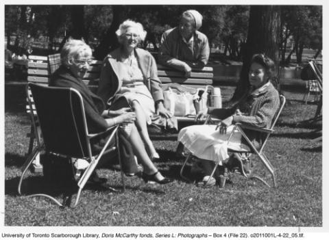 Ginny, Flo, Doris, and Nan having picnic in a park