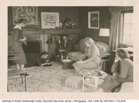 Doris McCarthy entertaining friends in living room at Fool's Paradise