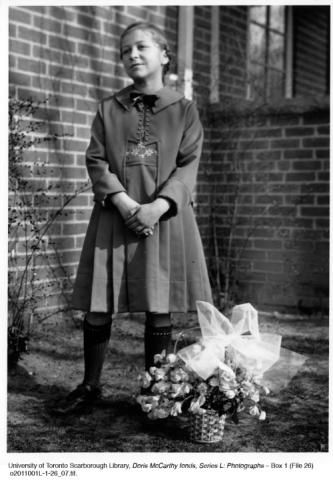 Doris McCarthy with basket of flowers at St. Aidan's church