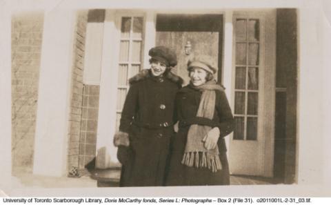 Doris McCarthy with Marjorie in front of the house