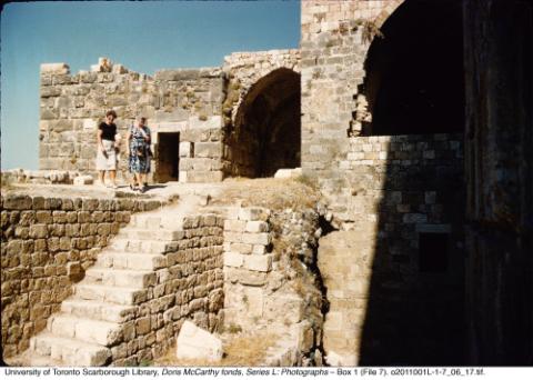 Two women with stone steps at Byblos archaeological site